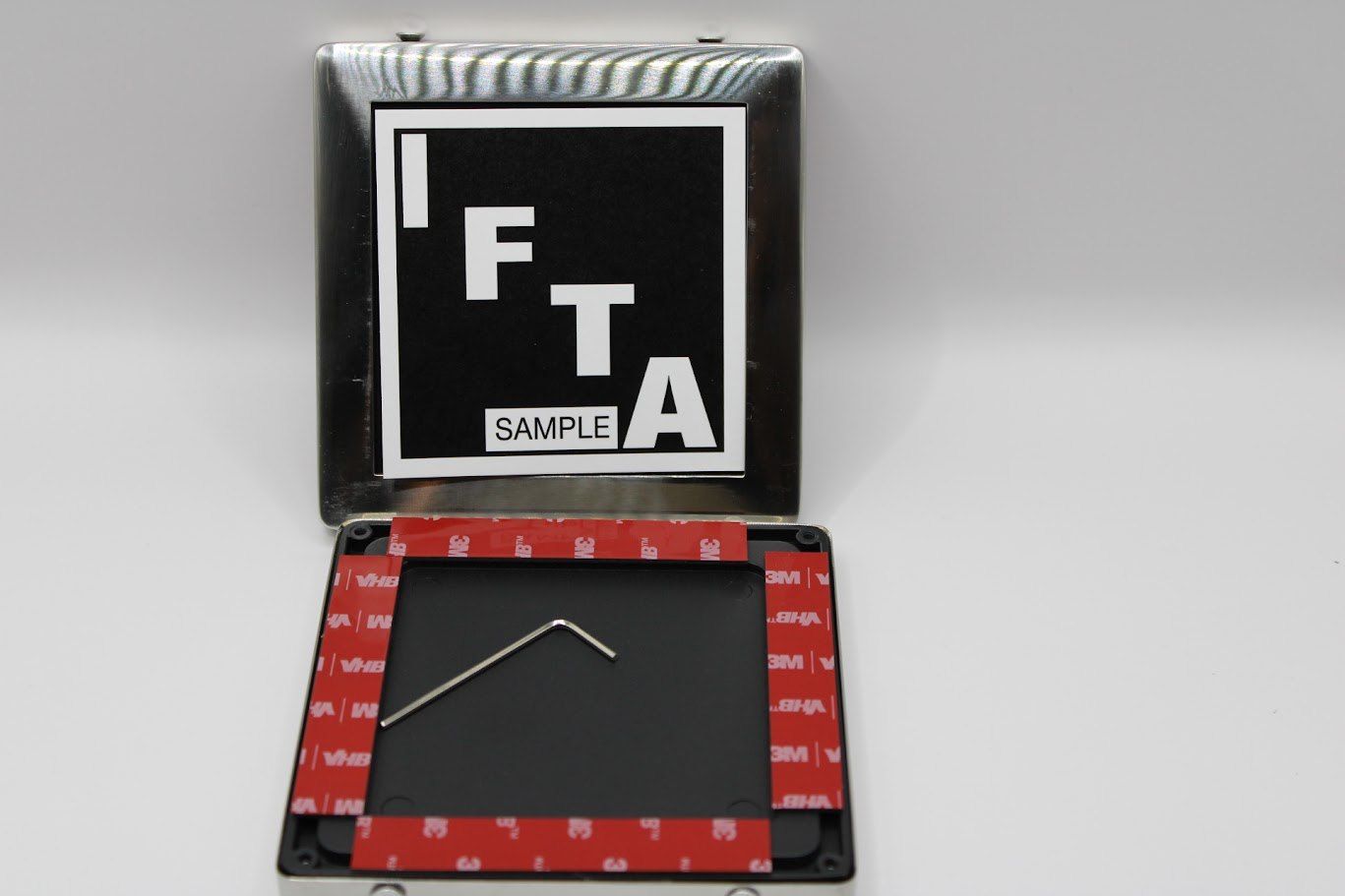 Stickerguard IFTA Guard, guard opened with gaskets and sample decal