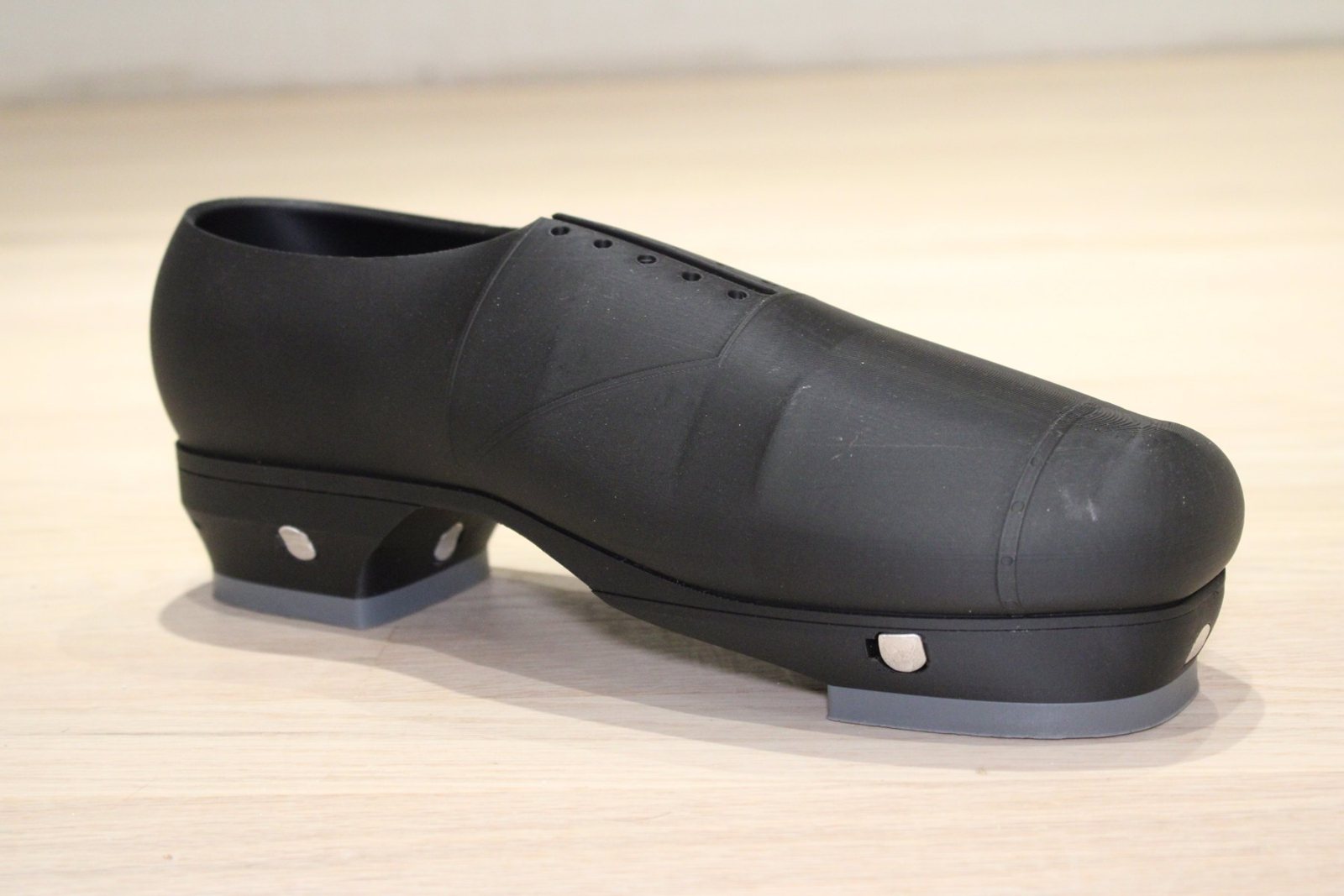 Finished tap shoe prototype with quick-release plates installed