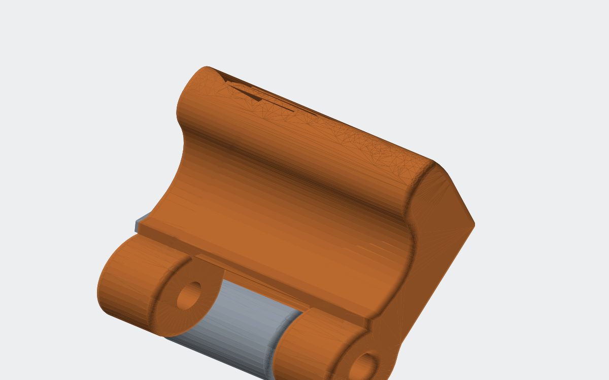 CAD render of the orange hinged jam pole clip on a steel pin